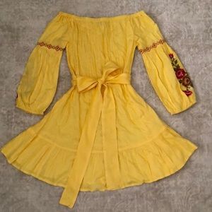 Yellow Spanish themed dress with red roses and a bow